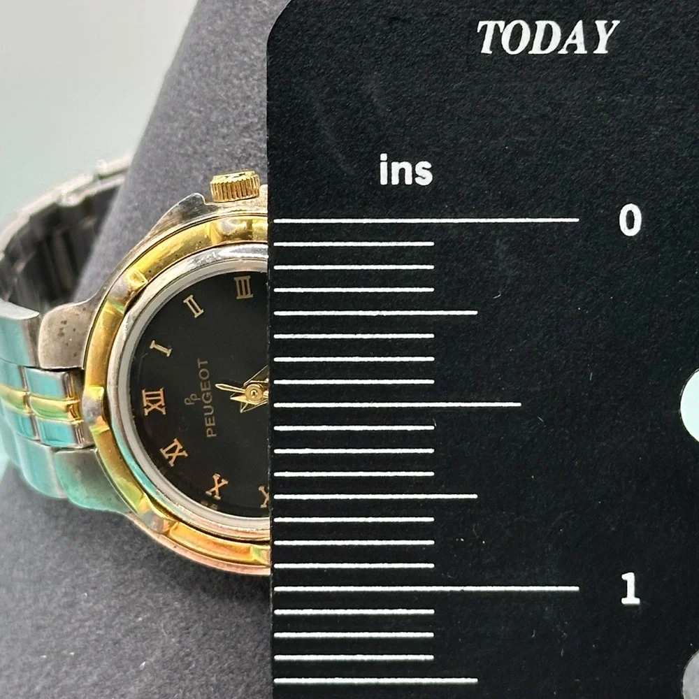 EUC Peugeot Black and Silver Watch
